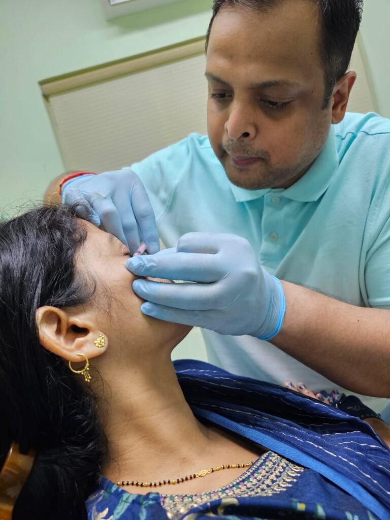 "Doctor giving a Botox injection to a woman for cosmetic treatment."